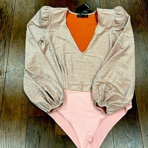 Eloquii bodysuit.  Color: Rose gold. Size:14/16. Has tags never worn.